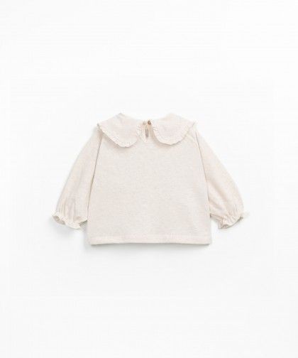 T-shirt con apertura sul retro