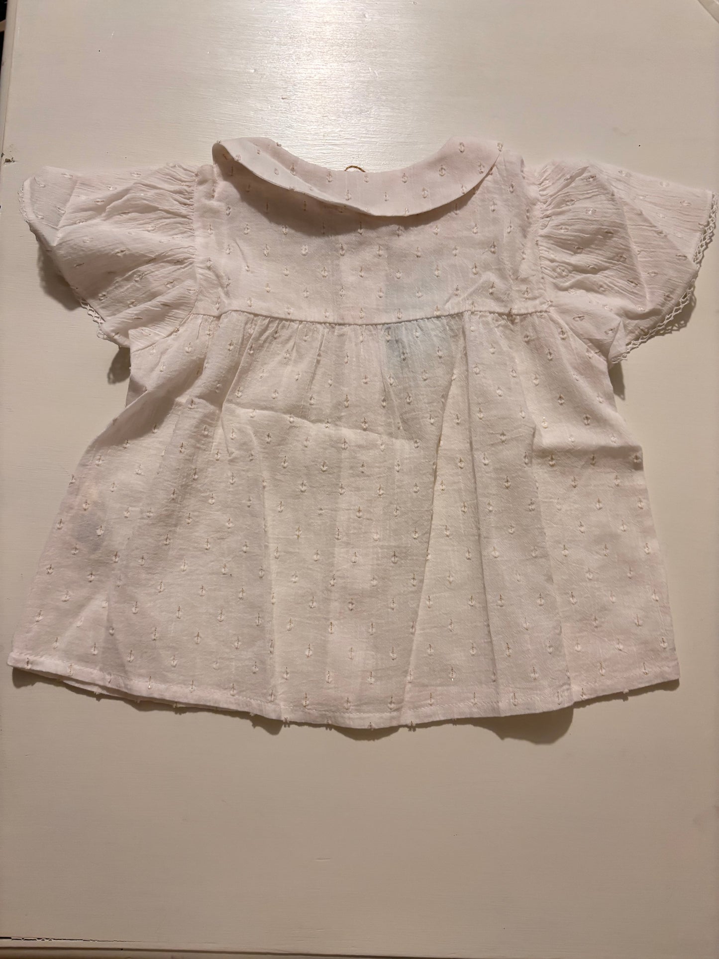 BLUSA PLUMETIL